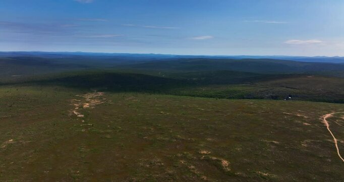 AERIAL: wild nature in vv Urho Kekkonen national park, summer day in Finland
