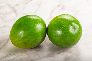 Two ripe green exotic avocado fruit