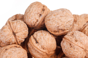 Walnuts are isolated on a white background,