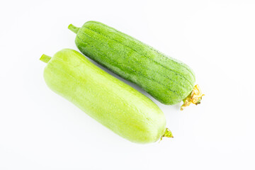 Fresh white loofah and green loofah