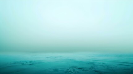 Obraz premium Gradient of a light to dark turquoise backdrop