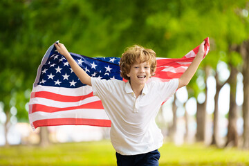 USA team supporter. American child with flag.