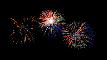 Colorful fireworks exploding on  black sky. Celebration and anniversary concept