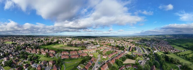 A drone's-eye view captures Dewsbury Moore Council estate's fame, a typical UK urban council-owned...