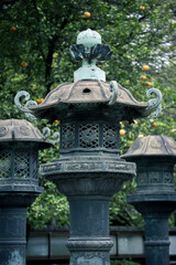 statue in the park, lantern, Tokyo Japan