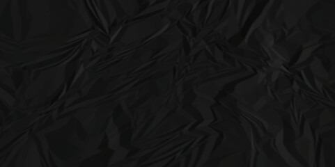Black crumpled paper texture . wrinkled paper texture. Black paper texture . crumpled and top view textures can be used for background of text or any contents .