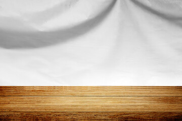 Wooden Board Empty Table Top White cloth background abstract with soft waves