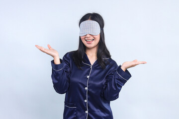 Woman Wear Sleep Eye Mask And Pajamas Showing Happy Expression