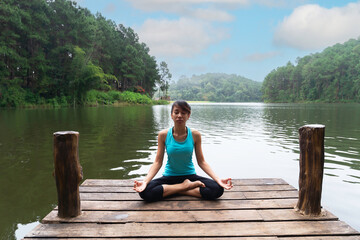 Fototapeta premium Lifestyle woman yoga exercise and pose for healthy life.Fitness and healthy lifestyle.
