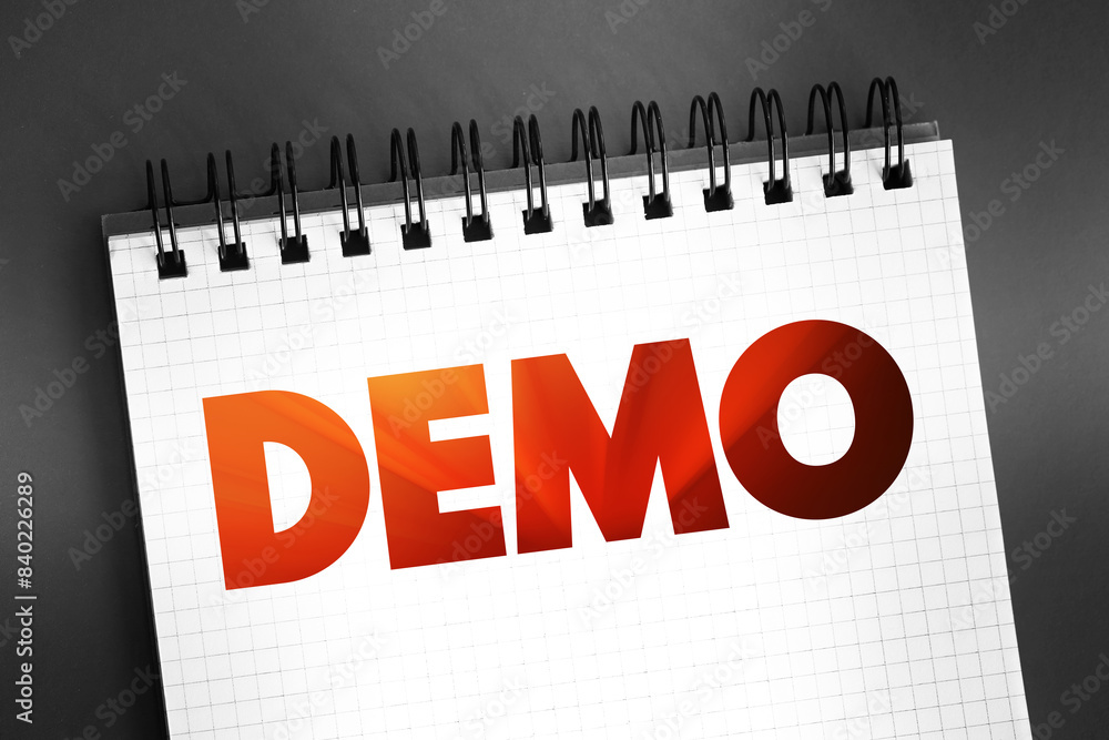 Poster Demo - demonstration of a product or technique, text on notepad concept background