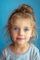 Naklejka premium A sweet-looking young girl with bright blue eyes and a messy bun, sitting or standing in various settings