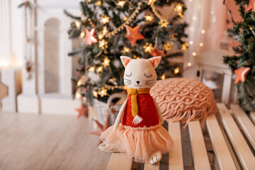 Door stopper cat with tulle skirt. Decoration for Christmas, New Year.