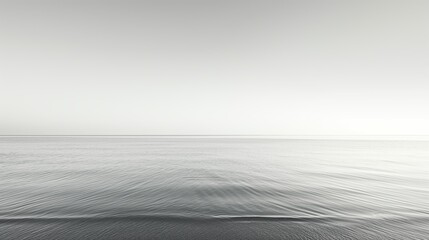 Minimalist Black and White Seascape with Calm Waters and Clear Horizon