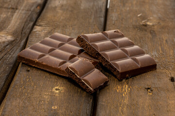 porous chocolate on a wooden background