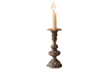 A timeless, ornate antique candlestick holder with a burning candle, emitting warmth and historical charm