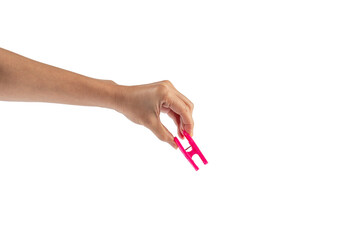 Close up of clothes peg in hand on transparent background