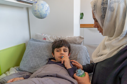 Mother caring for child during hypoglycemic episode at home