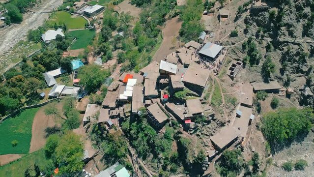 Aerial top down drone footage of Kalash Valley and Chilam Joshi Festival , Rumbur , Chitral, Pakistan