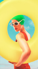 Young woman in stylish sunglasses, cap and red swimsuit holding yellow floating circle. Swimming in...