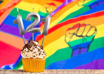 Birthday candle number 121 - Gay march flag background