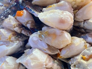 close up pickled fresh raw crabs at seafood market.