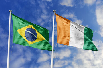 3D illustration. Brazil and Ivory Coast Flag waving in the sky. High detailed waving flag. 3D...