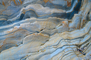 Intricate rock formations with diverse color patterns