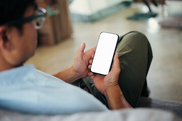 cell phone blank white screen mockup.hand holding texting using mobile on desk at office.background...