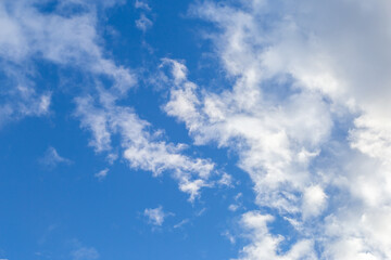 Bright sky texture background with white clouds, pleasing to the eye.