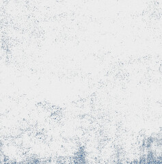 The wall is white with blue spots on the surface in close-up