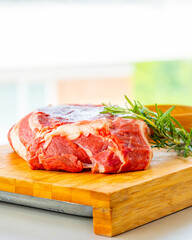 Fresh Raw Veal Cut of Meat with Spices and Rosemary Ready to Cook Close Up