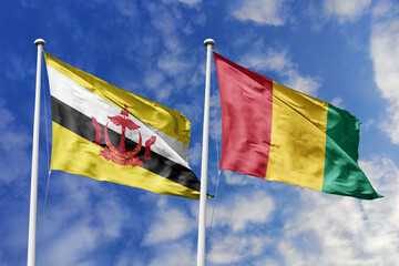 3d illustration. Brunei and Guinea Flag waving in sky. High detailed waving flag. 3D render. Waving in sky. Flags fluttered in the cloudy sky.