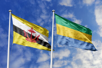 3d illustration. Brunei and Gabon Flag waving in sky. High detailed waving flag. 3D render. Waving in sky. Flags fluttered in the cloudy sky.