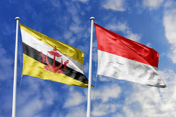 3d illustration. Brunei and Indonesia Flag waving in sky. High detailed waving flag. 3D render. Waving in sky. Flags fluttered in the cloudy sky.