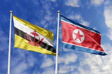 3d illustration. Brunei and North Korea Flag waving in sky. High detailed waving flag. 3D render. Waving in sky. Flags fluttered in the cloudy sky.