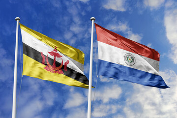 3d illustration. Brunei and Paraguay Flag waving in sky. High detailed waving flag. 3D render....