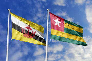 3d illustration. Brunei and Togo Flag waving in sky. High detailed waving flag. 3D render. Waving...