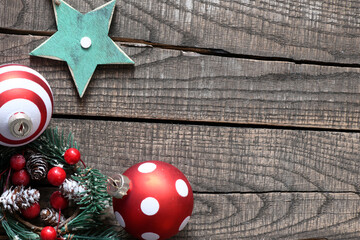 Christmas decorations on a wooden table with an empty place. Holidays Christmas background.