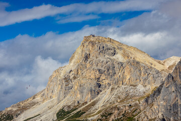 Dolomites mountains, Alpi Dolomiti beautiful scenic landscape in summer. Italian Alps mountain summits and rocky tower peaks above green valley alpine scene near Cortina'd'Amprezzo