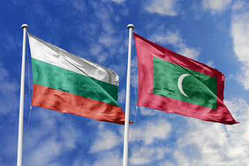 3D illustration. Bulgaria and Maldives Flag waving in the sky. High detailed waving flag. 3D render. Waving in the sky. Flags fluttered in the cloudy sky.