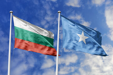 3D illustration. Bulgaria and Somalia Flag waving in the sky. High detailed waving flag. 3D render. Waving in the sky. Flags fluttered in the cloudy sky.