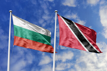3D illustration. Bulgaria and Trinidad and Tobago Flag waving in the sky. High detailed waving flag. 3D render. Waving in the sky. Flags fluttered in the cloudy sky.