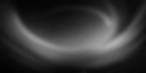 Abstract gradient background featuring deep shades of black and gray, blending seamlessly to create a dynamic and visually captivating design with a mysterious and calming feel