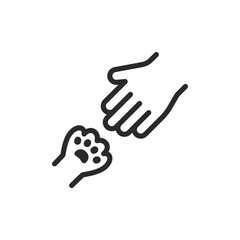 Animal assistance, linear style icon. Magnifying glass and animal paw reaching out. Helping paw. Editable stroke width