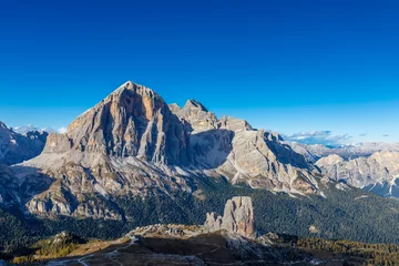 Fototapeten Fallen Dolomites mountains, Alpi Dolomiti beautiful scenic landscape in summer. Italian Alps mountain summits and rocky tower peaks above green valley alpine scene near Cortina'd'Amprezzo  © Yuliia