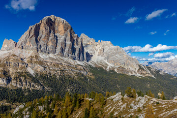 Dolomites mountains, Alpi Dolomiti beautiful scenic landscape in summer. Italian Alps mountain summits and rocky tower peaks above green valley alpine scene near Cortina'd'Amprezzo