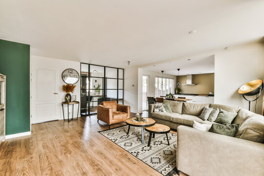 Modern open-plan living room with stylish decor in Sikkelstede, Netherlands