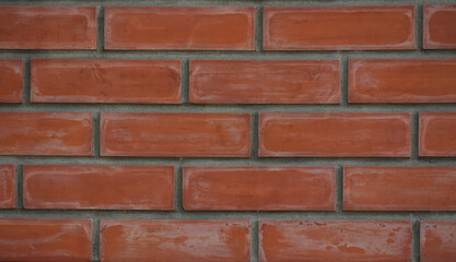 The background image is red bricks and cement.