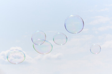 A beautiful, clean shot of soapbubbles quietly floating through the air