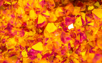 Multi-colored crystal mineral stone. Gems. Mineral crystals in the natural environment. Texture of precious and semiprecious stones. shiny surface of precious stone